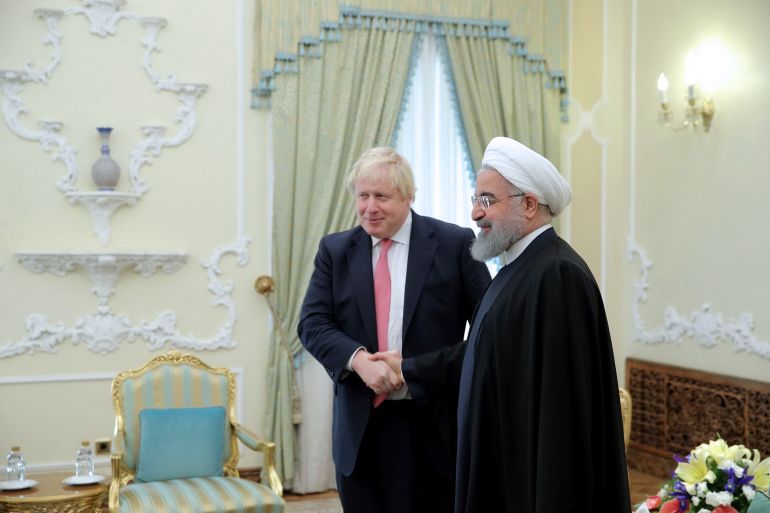 وزير الخارجية البريطاني بوريس جونسون خلال لقائه الرئيس الإيراني حسن روحاني