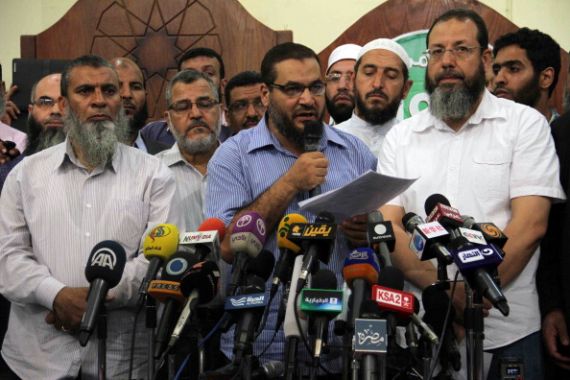 القيادي بالجماعة الإسلامية، صفوت عبد الغني، يتحدث خلال مؤتمر صحفي في القاهرة يوليو 2013