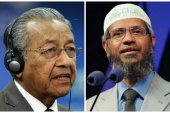 الداعية الإسلامي الدكتور ذاكر نايك (يمين) ورئيس وزراء ماليزيا مهاتير محمد 
