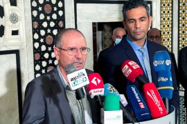 The head of UGTT union, Noureddine Taboubi, speaks during a joint news conference with Minister of Employment Nasreddine Nsibi in Tunis