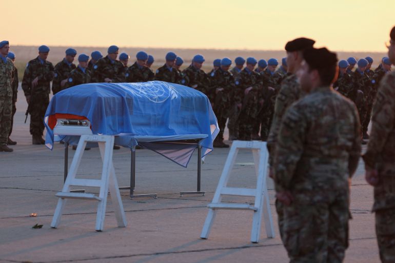 Members of UNIFIL peacekeepers attend the repatriation ceremony for Irish soldier Sean Rooney who was killed on a U.N. peacekeeping Patrol, at Beirut international airport
